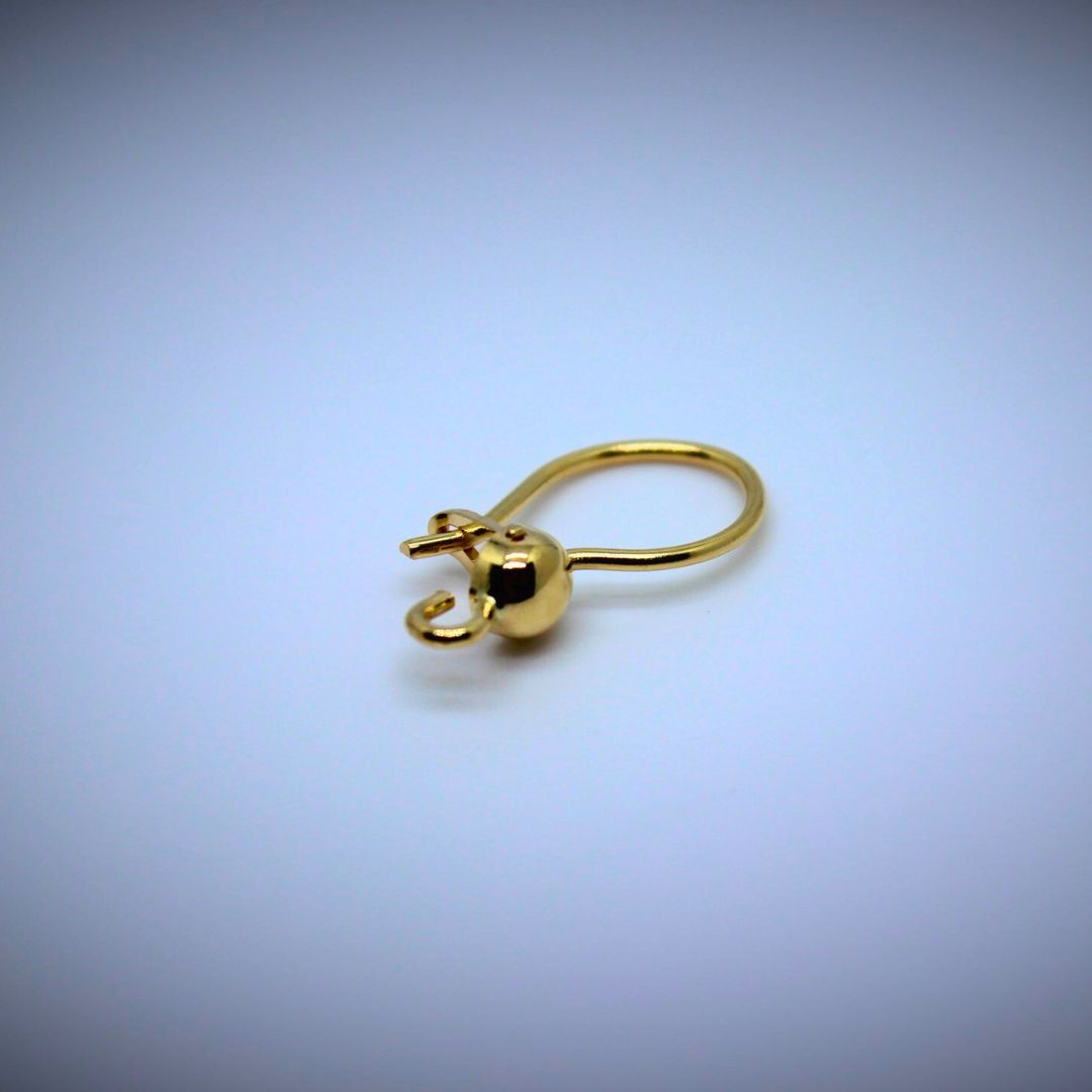 Korvakorukoukku puolipallolla, 18K